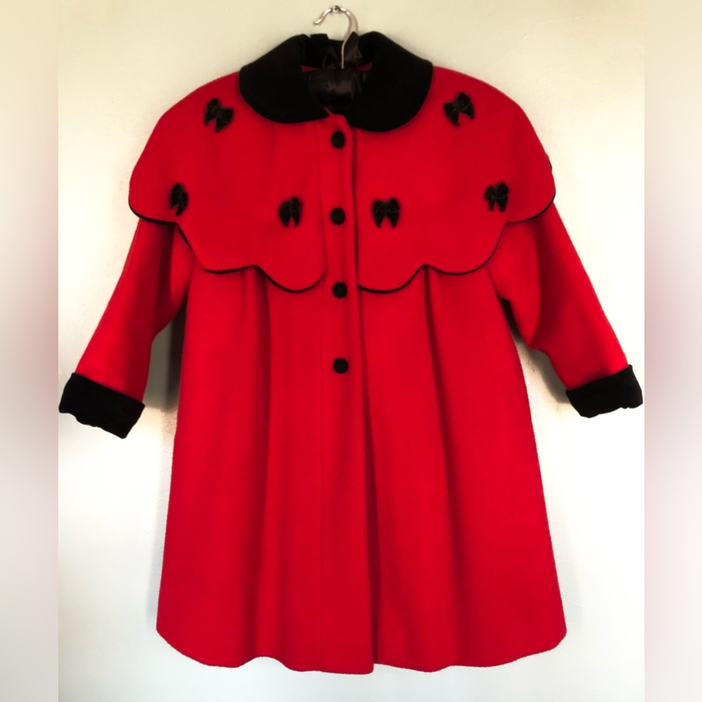 Red wool coat with velvet trim.